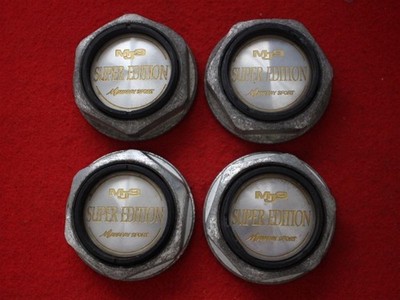 JDM Set of 4 aftermarket used Manalei Super Edition wheel center caps No Tires