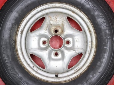 JDM Skyline Japan C210 genuine steel 4.5J-14 PCD114.3 4 holes +25 hub No Tires - Image 3
