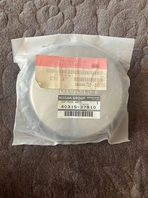 JDM Nissan Figaro genuine wheel cap 1 sheet Rare (No Tires)