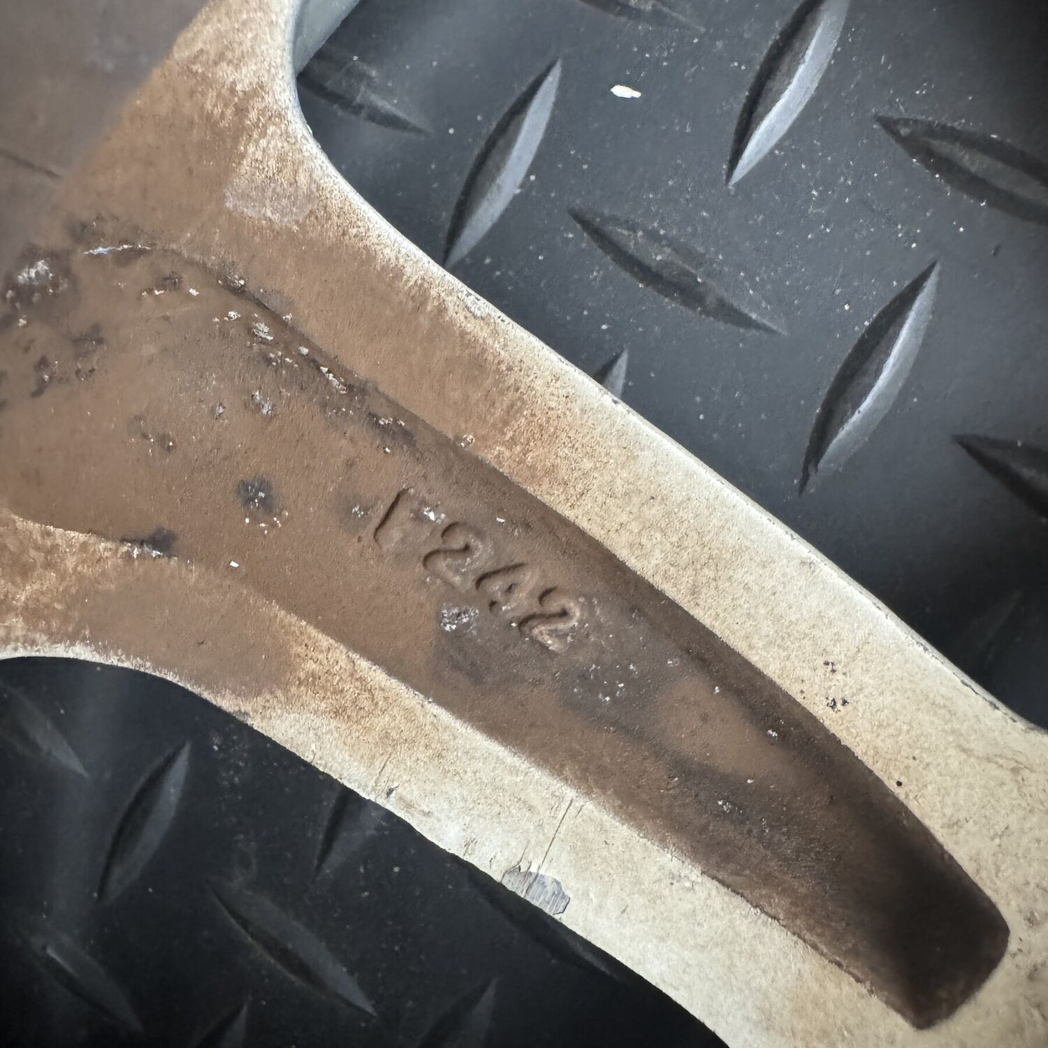 F242 cast into the back of a spoke
