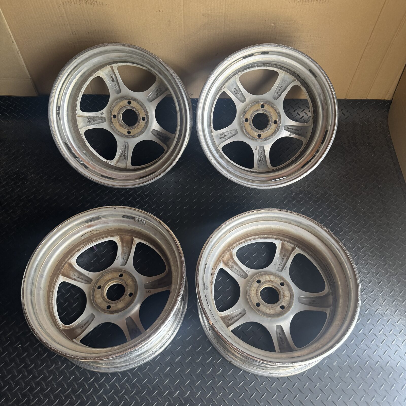 Four WORK Meister S1R wheels photographed from the rear