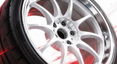 Illustrated multi-spoke racing wheel, WedsSport style, JP-Time.Club house-style artwork