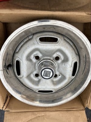 JDM Isuzu 117? Wheels old car. (No Tires)