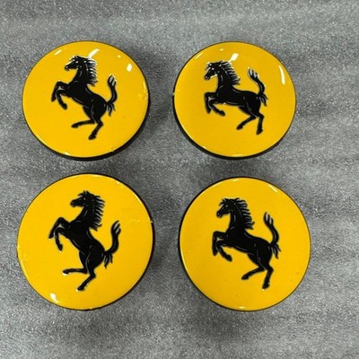 JDM Genuine Ferrari center caps 4-individual used. (No Tires)