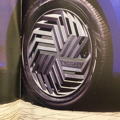 JDM Four genuine Nissan E13 Note wheel caps. (No Tires)