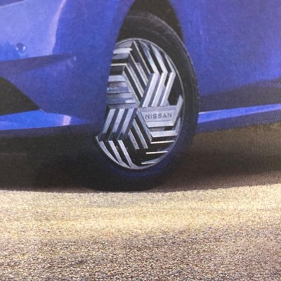 JDM Four genuine Nissan E13 Note wheel caps. (No Tires) - Image 2