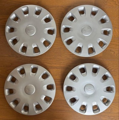 JDM Wheel caps set of 134 genuine Daihatsu parts. (No Tires)