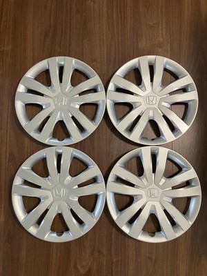JDM Honda Fit genuine wheel caps set of 154. (No Tires)