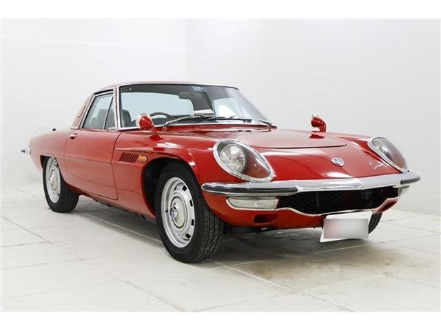Red Mazda Cosmo Sport L10B front three-quarter view showing 15-inch wheels