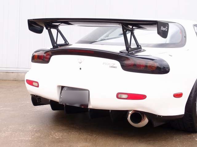 Close-up of the RE-Super G rear wing on a Mazda RX-7 FD3S