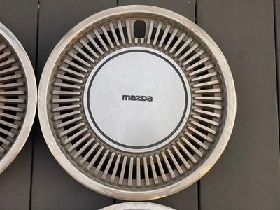 JDM Genuine Mazda wheel caps set of 4 original parts from that era. (No Tires) - Image 3