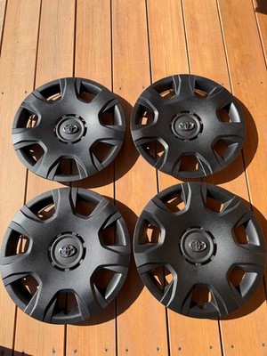 JDM Toyota Hiace genuine wheel caps with chipping paint finish. (No Tires)