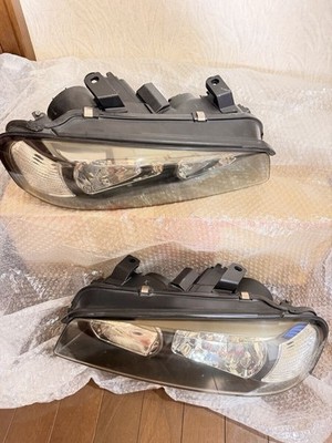 JDM Nissan Skyline R34 headlights left and right genuine halogen type. (No Tires) - Image 2