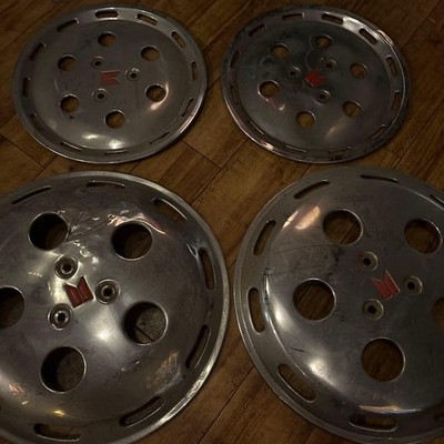 JDM Mitsubishi genuine wheel caps set of 4. (No Tires)